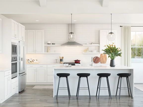 Kitchen with pendant lighting and floating shelves