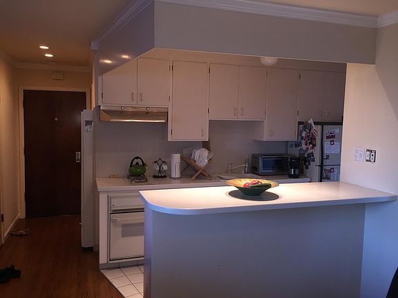 Kitchen and entrance as viewed from main room (note: 2 gas burner has been changed to 4 burners)