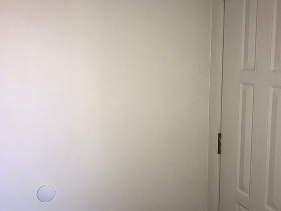 Front door stopper and knob protector