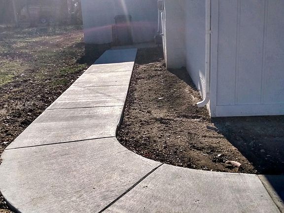 NEW SIDEWALK TO THE BACK DOOR