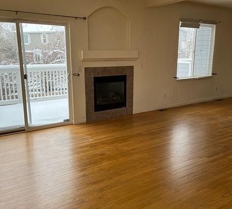 living room area with gas fireplace