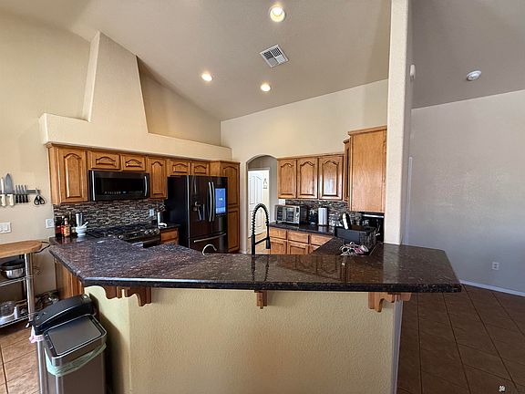 5th image of 11653 S Chaparral Dr