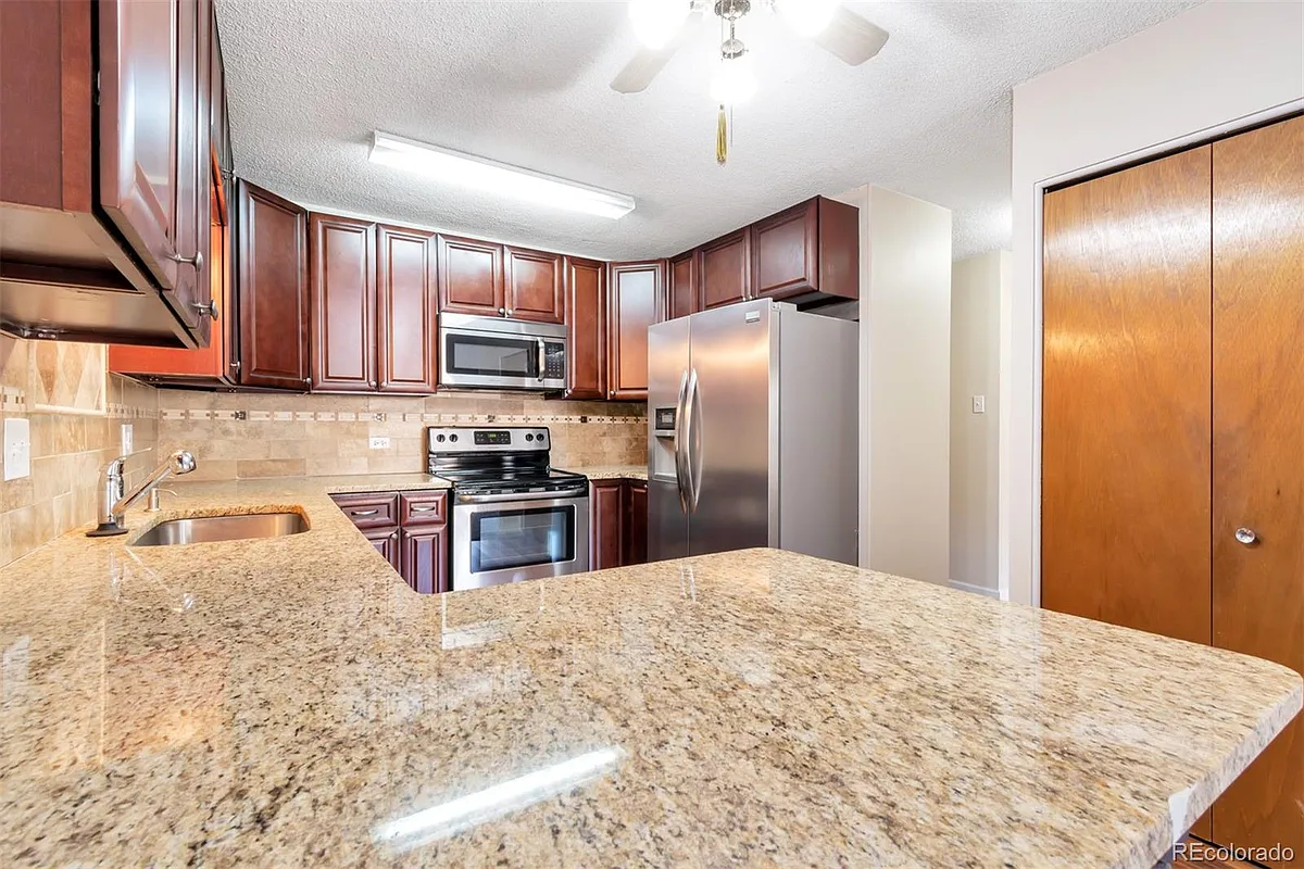 Building Photo - 9655 E Center Ave #6C