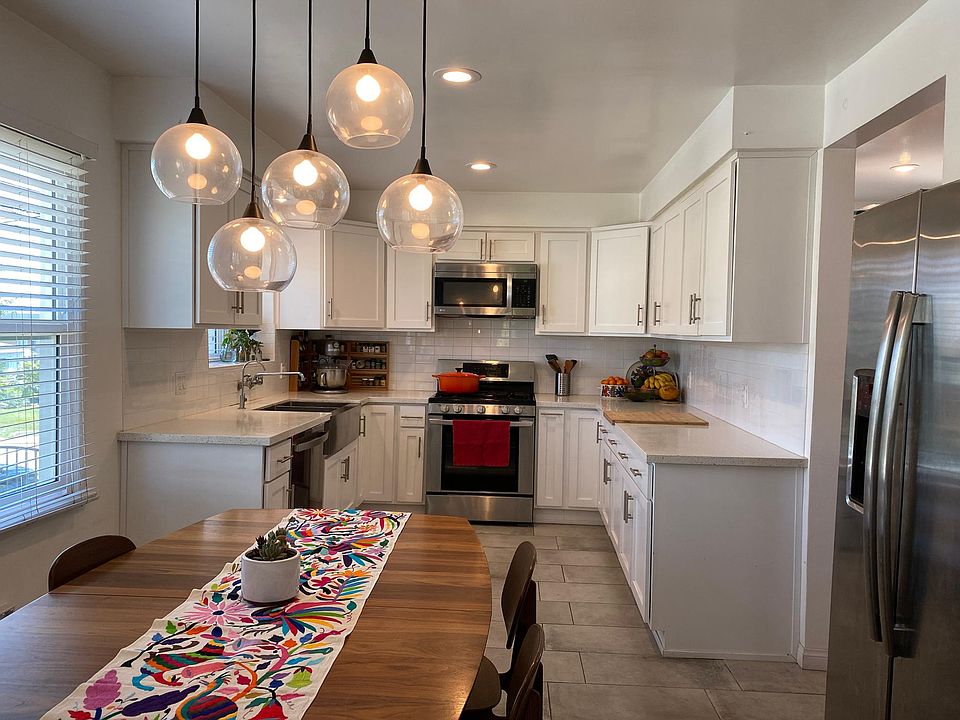 Remodeled kitchen with architectural lighting.