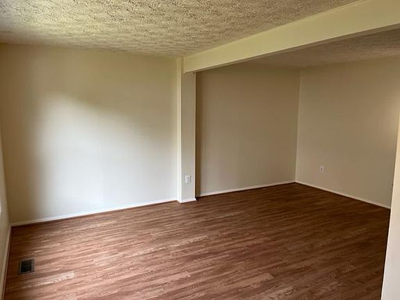 Main level living room. Entry, coat closet and half-bath not shown.