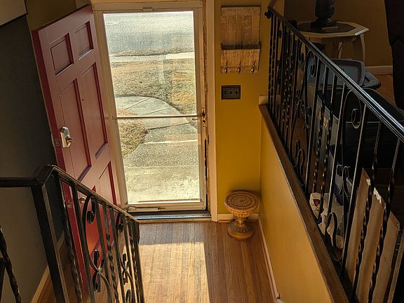 Foyer With Coat Hooks And Mail Storage