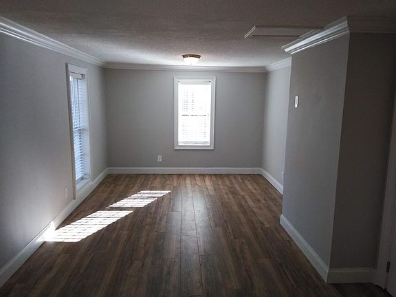 View from back of bedroom entering bathroom