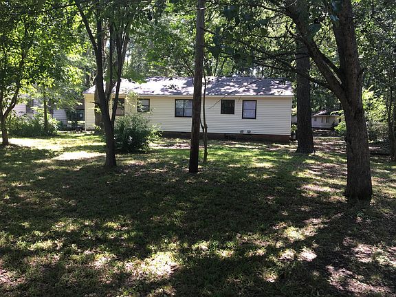 Back side of house and backyard