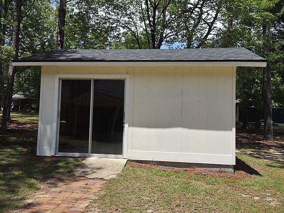 Large Permanent Storage Building on property.
