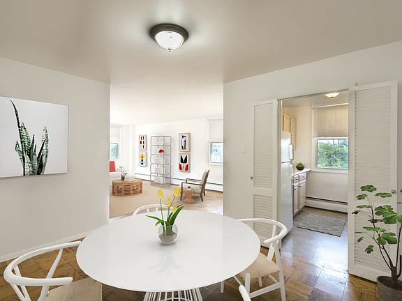 Kitchen and Dining Room with Parquet Hardwood Flooring