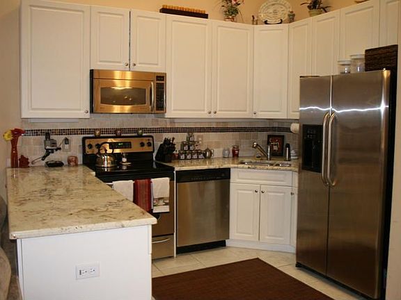 Upgraded Kitchen with granite and stainless steel