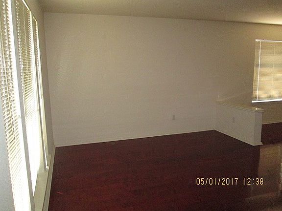Upon entering Gleaming hardwood floors greet everyone one. This sitting area will welcome all the guests who enter this home.