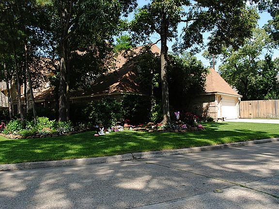 Large treed corner lot is the perfect place for the children to play.