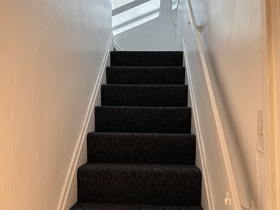 3rd Floor bedroom steps leading to 2nd Floor (it's door opens right next to the front bedroom (ideal to consider these two rooms as a mini-private apt_ if 2 people were to share the house)