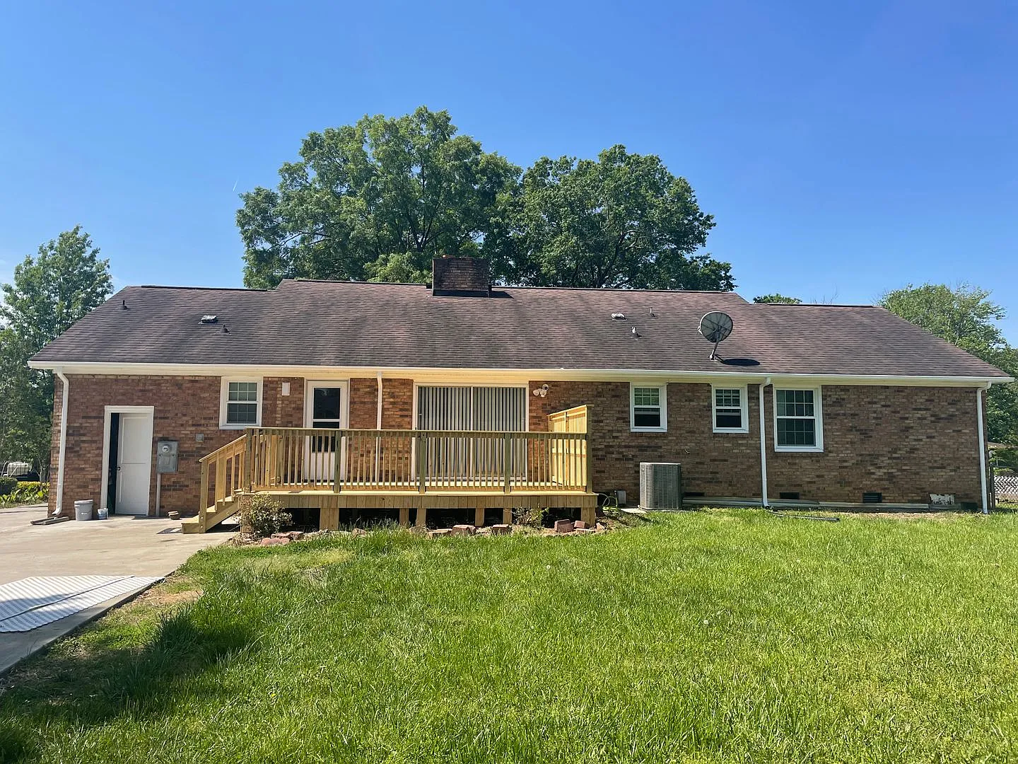 Elegant Brick Ranch with Updated Interiors & Backyard Deck — Photo 2