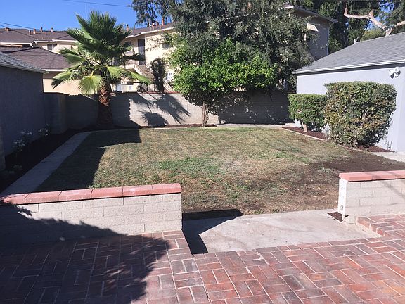 Brick patio and backyard