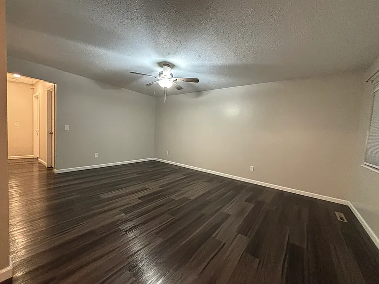 Large, open concept living room flows seamlessly into the kitchen.