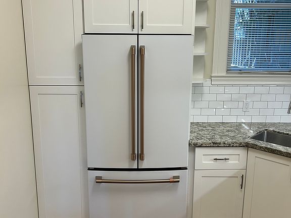 French Door Refrigerator with slide drawer freezer with ice maker