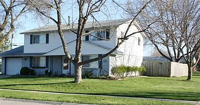 Side of house, which is a larger corner lot!