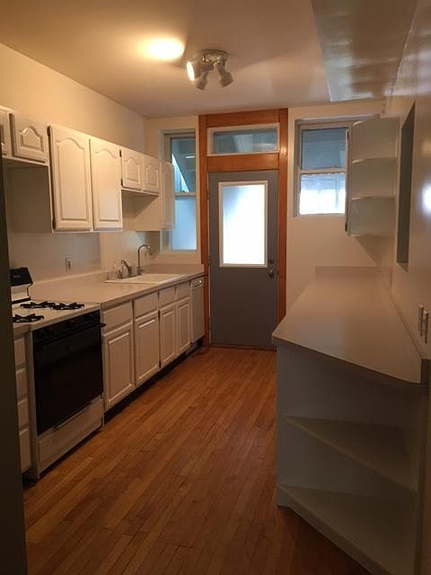 Kitchen - facing north to back porch/storage