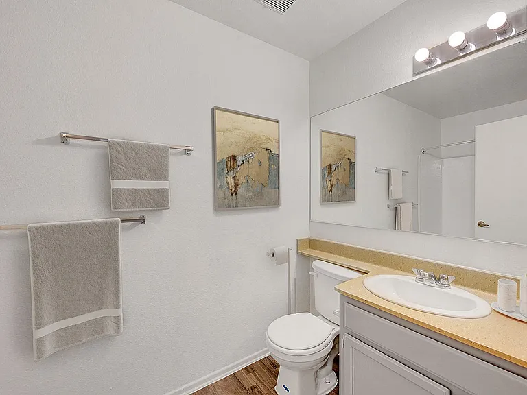 Experience the serenity of this elegantly designed bathroom, featuring contemporary elements for a refined look.