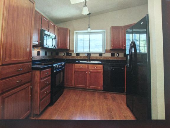 Kitchen with granite tile