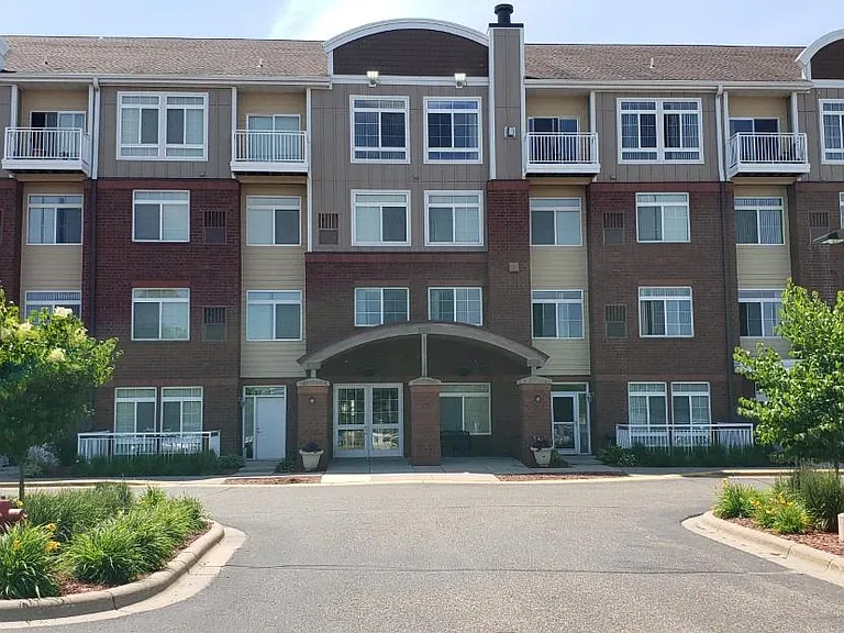 Beautifully acccented brick front with ample parking.