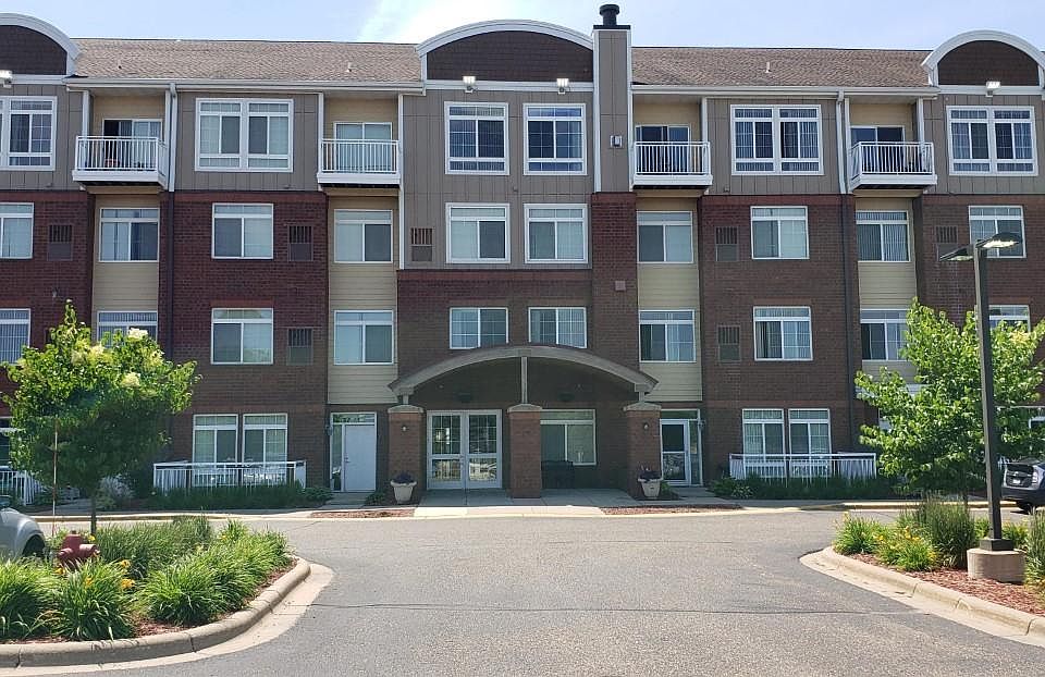 Beautifully acccented brick front with ample parking.