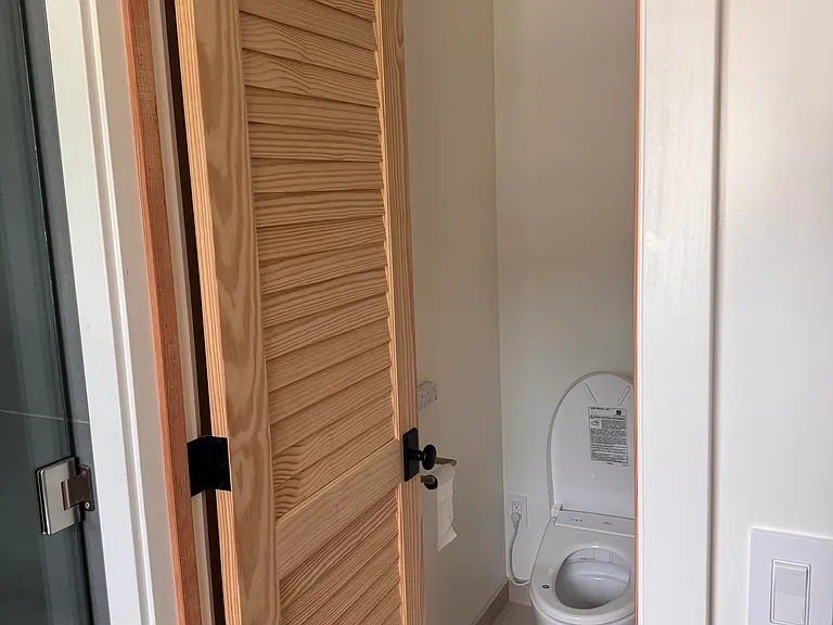 Toilet room, shower on the left