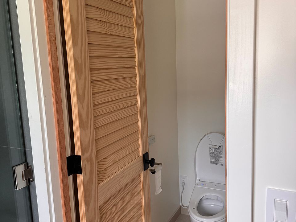 Toilet room, shower on the left