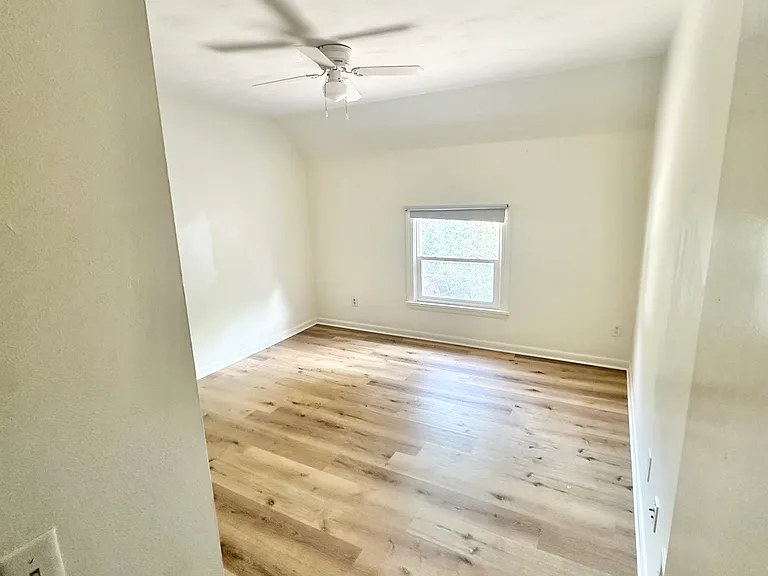 Primary bedroom without staging