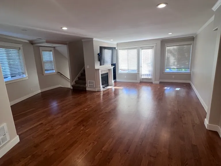 Huge great room on main floor featuring living, dining and kithchen along with 1/2 bath.