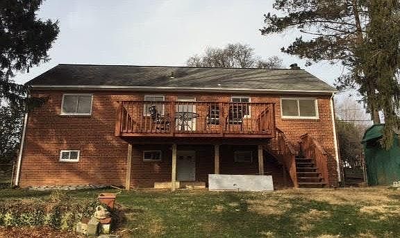.25 acre lot with a deck and a shed