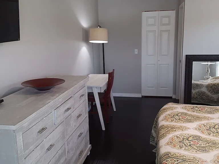 Primary bedroom with walk- in closet.