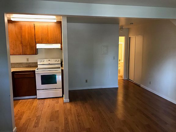 KITCHEN TO THE LEFT
DINING AREA TO THE RIGHT
LINEN CLOSET IN HALL