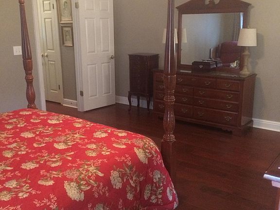 Master bedroom has extra large his and her closets