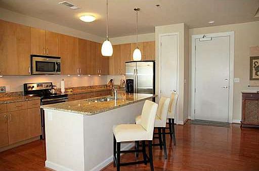 3rd image of 711 Cosmopolitan Dr NE Unit 200