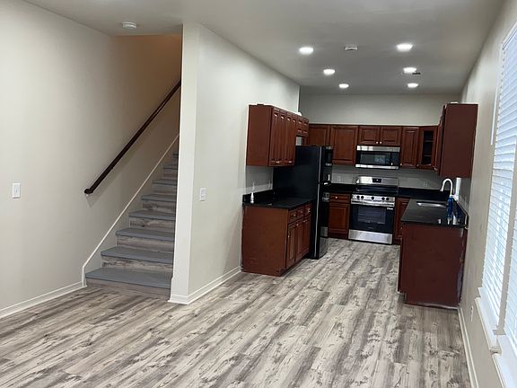 Open floor plan with living room and kitchen.