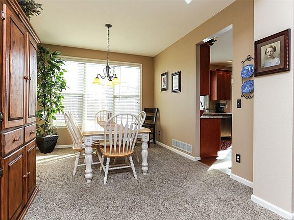 Spacious formal dining room next to the kitchen