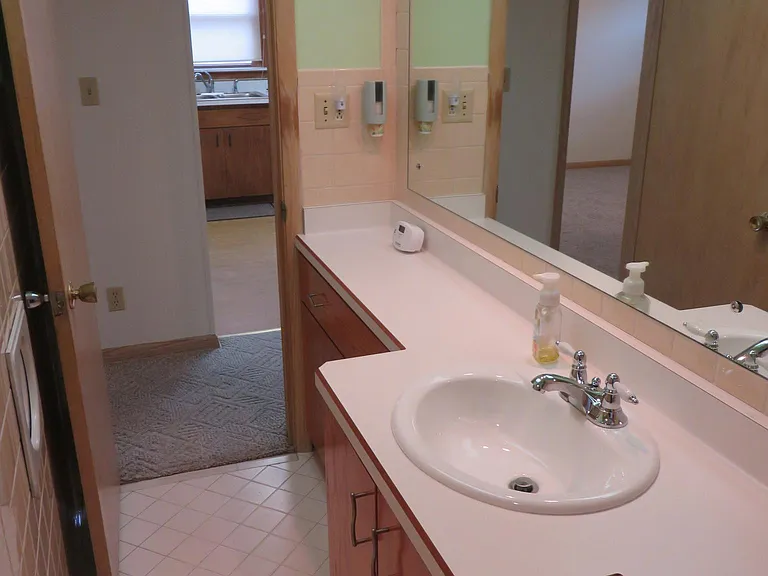 Bathroom looking out into hallway