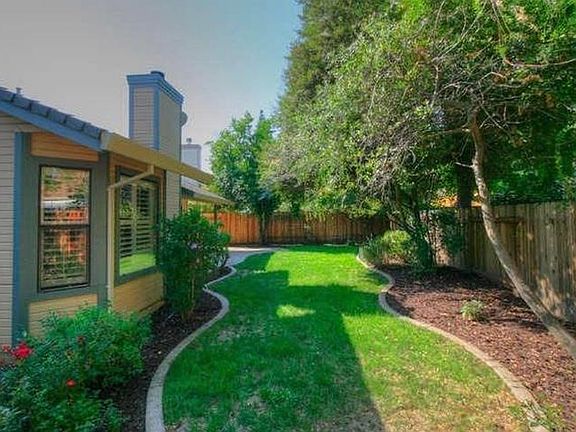 Landscaped with mature trees in backyard. Gardener included.