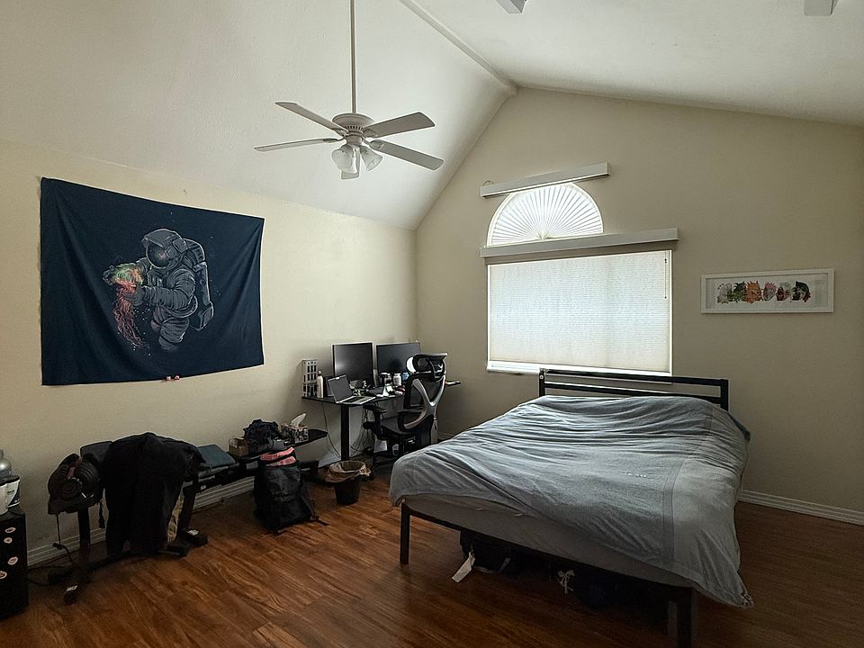 Large bedroom, privacy blinds and electric shades installed