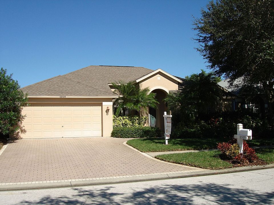 Beautiful paved driveway and entry path.