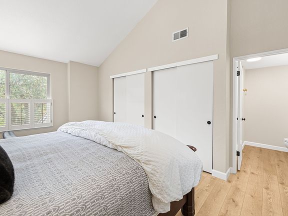 Primary bedroom features 2 closets and private bath