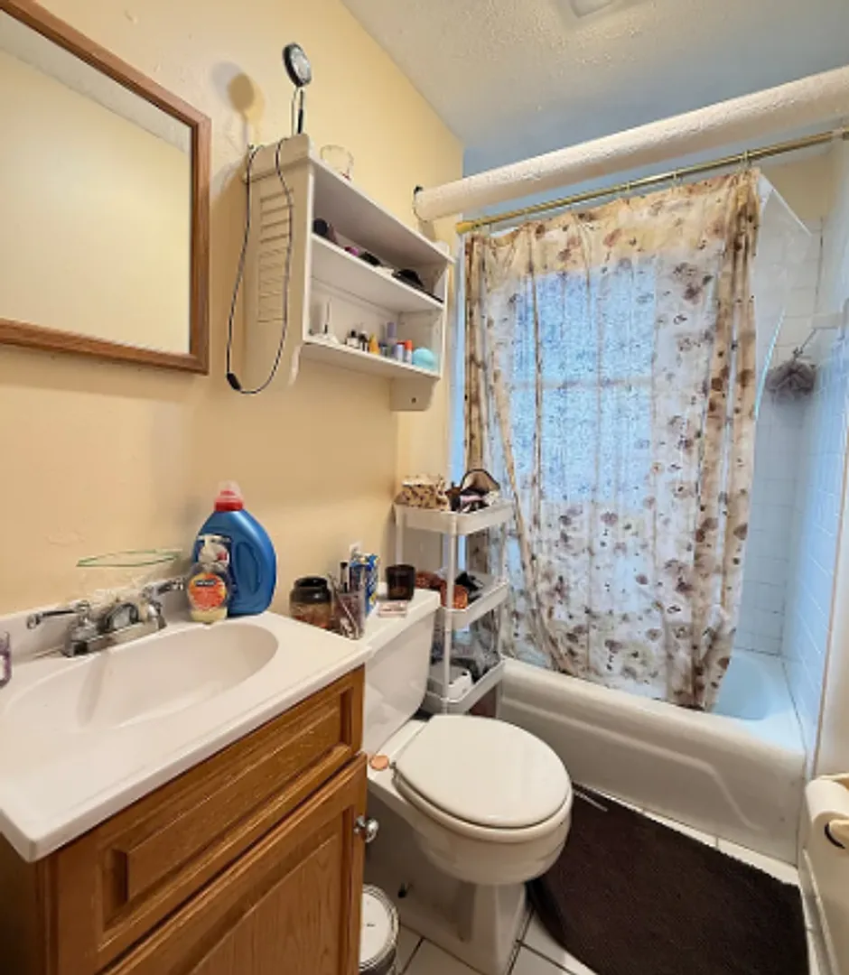 1BR with Heat & Hot Water Included | Steps to the Green Line — Photo 2