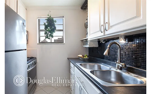 Sold by Douglas Elliman | media 11