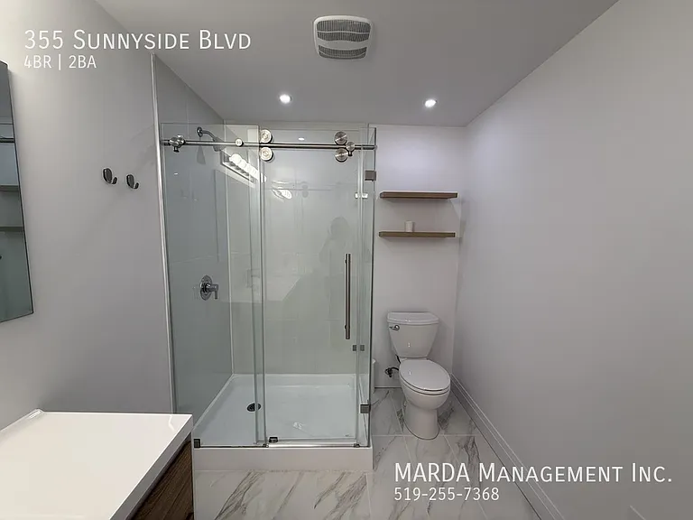 355 Sunnyside Blvd — Photo 56