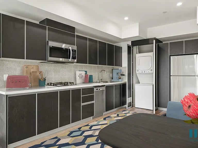 Kitchen with Stainless-Steel appliances and Ample Cabinet Storage - Oak Floor Plan