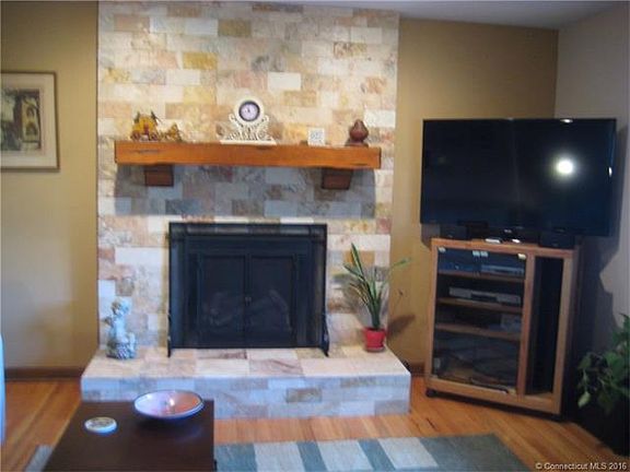 Gas logs in fireplace. Upda...