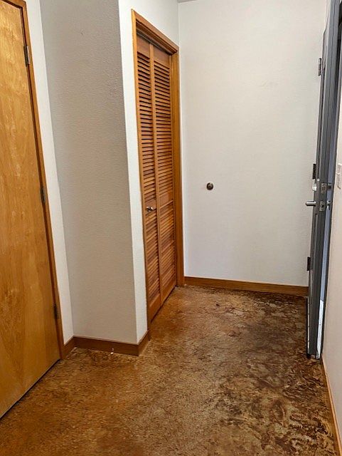 entry with hall closet and washer and dryer closet